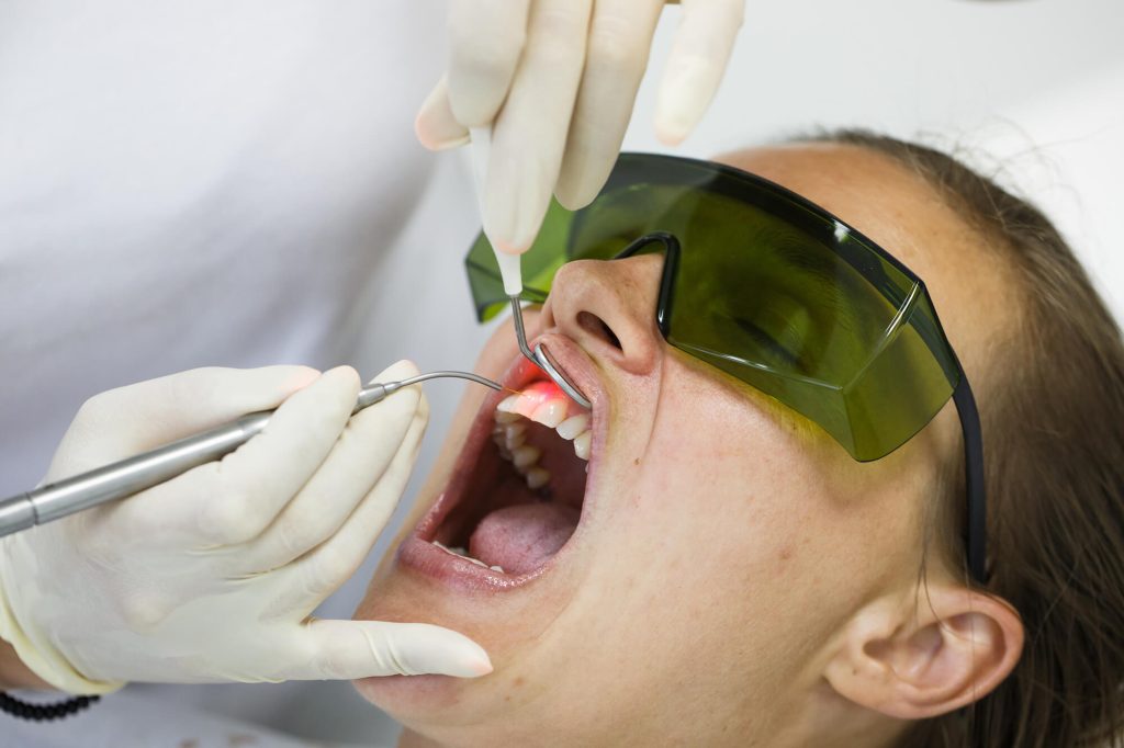 A woman getting laser treatment
