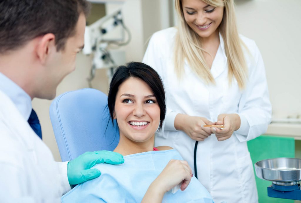 Female patient smiling during her dental visit
